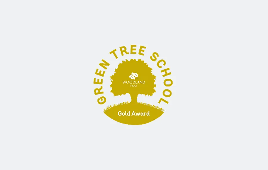 Green Tree School Gold Award from Woodland Trust featuring a tree silhouette.
