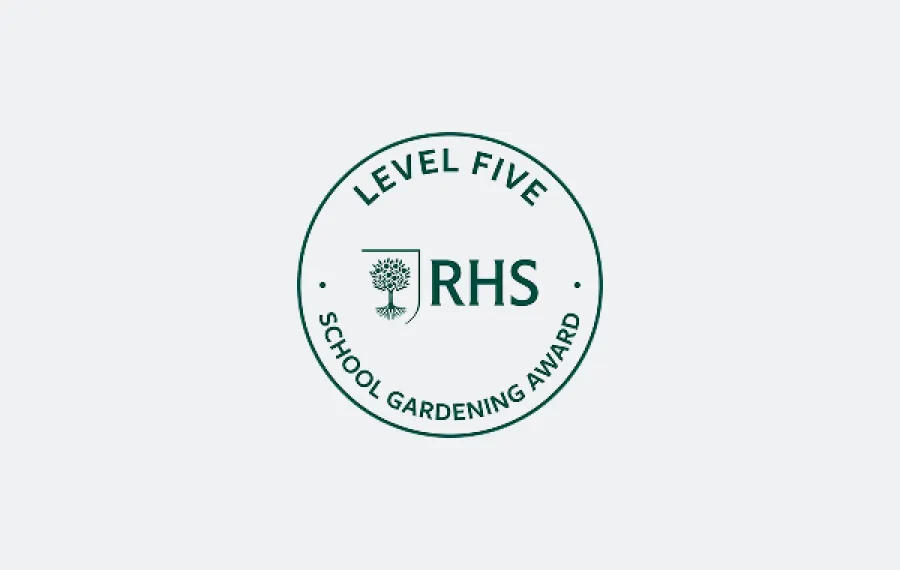 Round RHS Level Five School Gardening Award badge with tree emblem in centre.